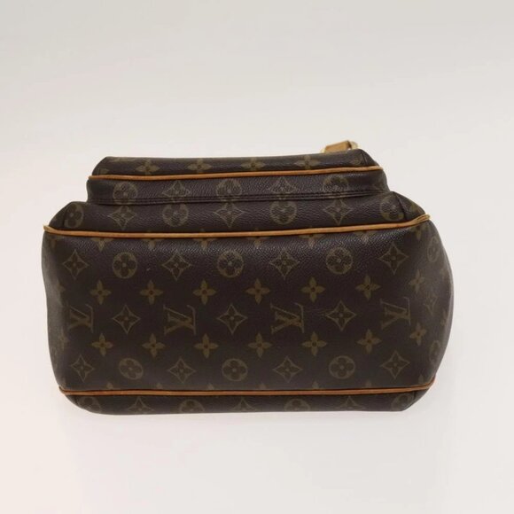 LOUIS VUITTON Monogram Tical GM Shoulder Bag - Picture 6 of 16